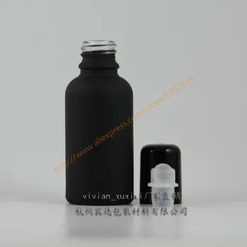 бутилка от матирано стъкло, черен на цвят, обем 100 мл, с черна закручивающейся капак + стъкло / неръждаема роликовая на кутията.